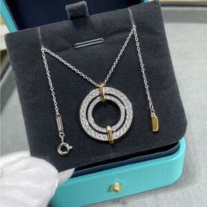 Tiffany & Co. Two-Tone Pave Circle Pendant Necklace in Silver and Gold